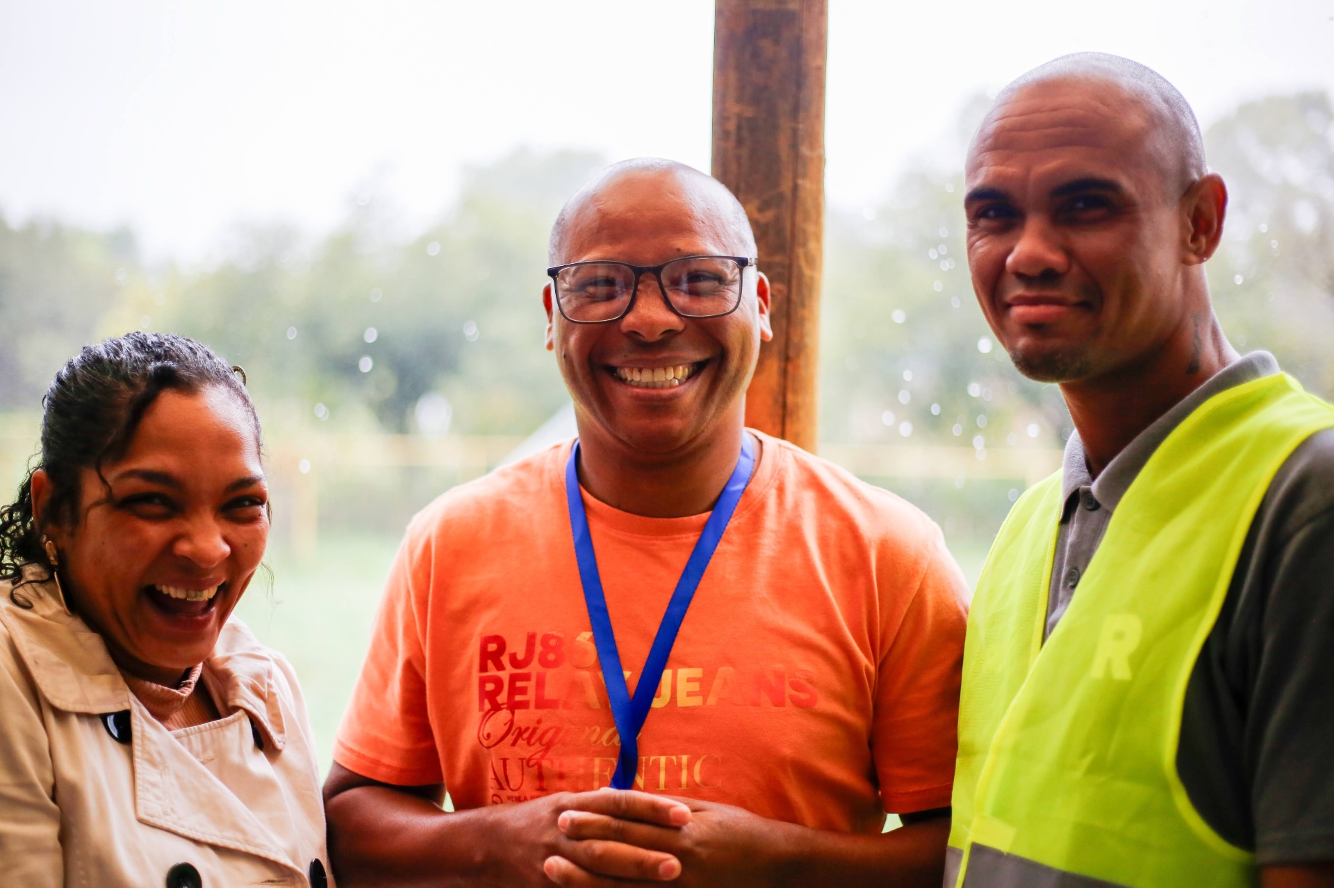 Three REIGN Church Serve Team members serving on a Sunday